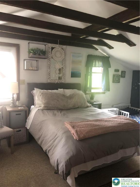 810 Dragonhead Way Stroudsburg, PA 18360 - Photo 18 of 21 a bedroom with a bed and a window