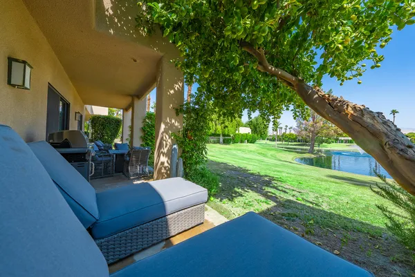 a view of a couches in the backyard