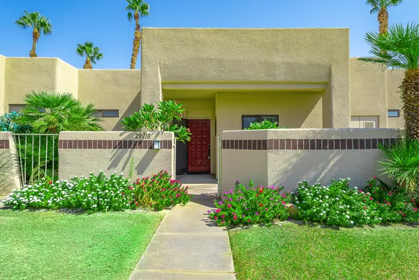 a view of a backyard with a patio