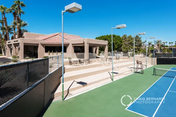 a view of an outdoor space and tennis court