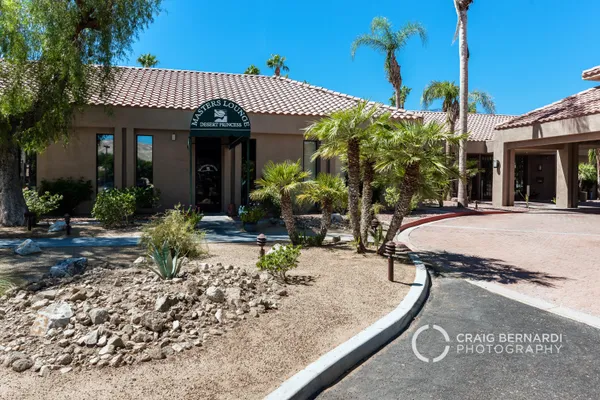 a view of an outdoor space with furniture