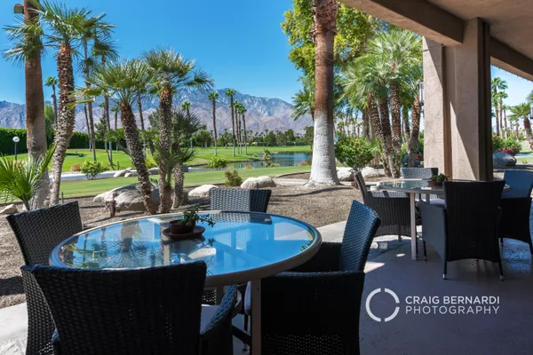 a view of a swimming pool and an outdoor space