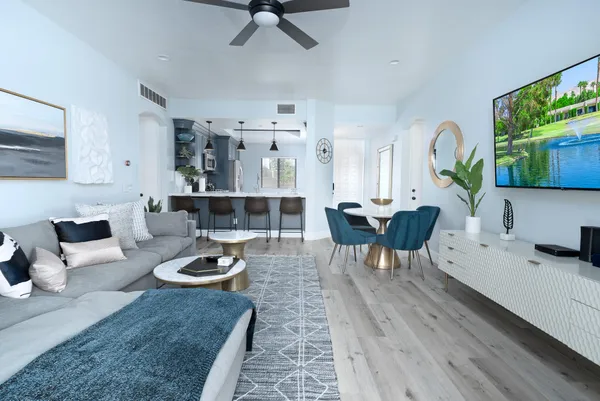 a living room with furniture and a window