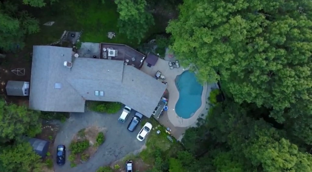 8 McCarthy Circle Framingham, MA 01702 - Photo 3 of 42 an aerial view of a house with outdoor space and trees all around