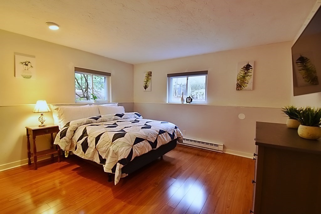 8 McCarthy Circle Framingham, MA 01702 - Photo 32 of 42 a bedroom with a bed and window