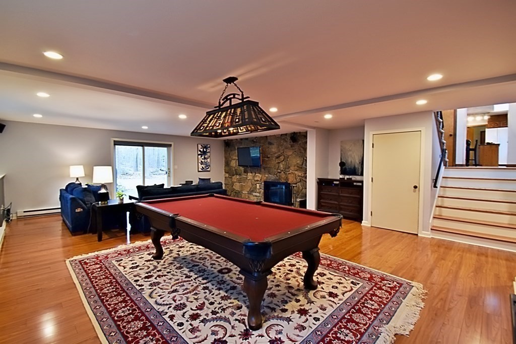 8 McCarthy Circle Framingham, MA 01702 - Photo 33 of 42 a dinning room with pool table and a rug
