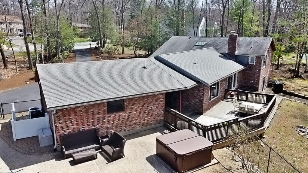 8 McCarthy Circle Framingham, MA 01702 - Photo 38 of 42 a view of an outdoor sitting area with brick walls