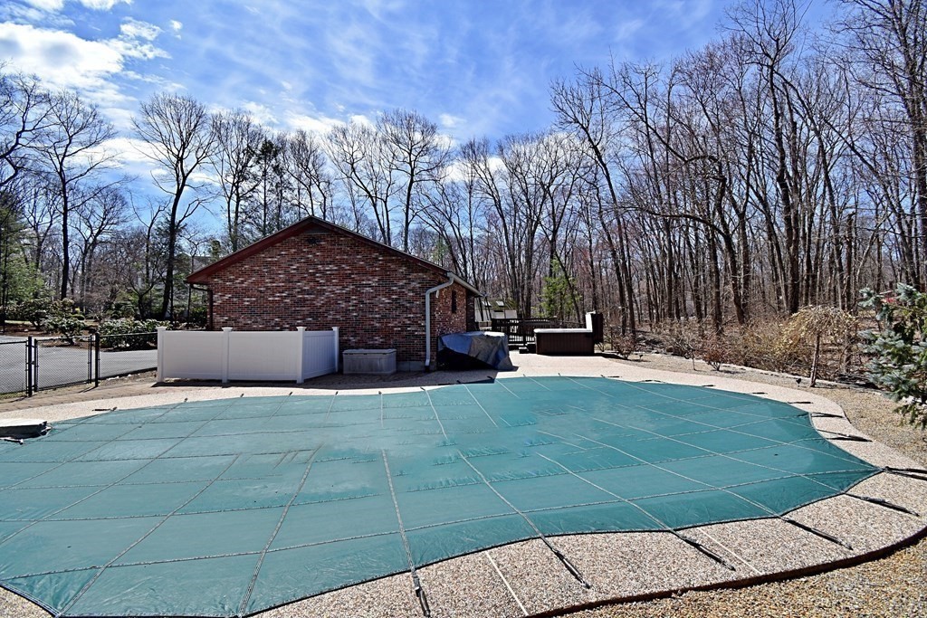 8 McCarthy Circle Framingham, MA 01702 - Photo 41 of 42 a view of backyard with tree