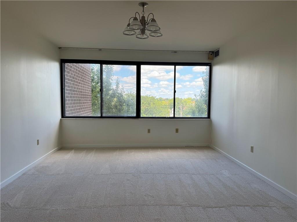 750 Washington Road, Unit 409 Pittsburgh, PA 15228 - Photo 14 of 21 an empty room with a window