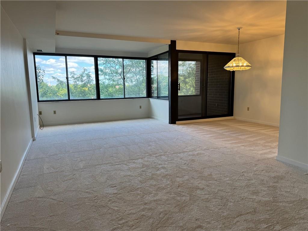 750 Washington Road, Unit 409 Pittsburgh, PA 15228 - Photo 18 of 21 a view of an empty room with a window