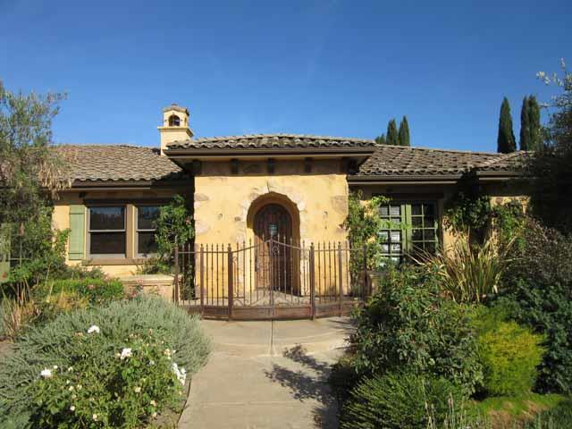 16648-34 Alpine Road Lodi, CA 95240 - Photo 4 of 29 a front view of a house with a garden