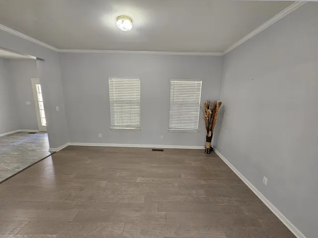 an empty room with windows