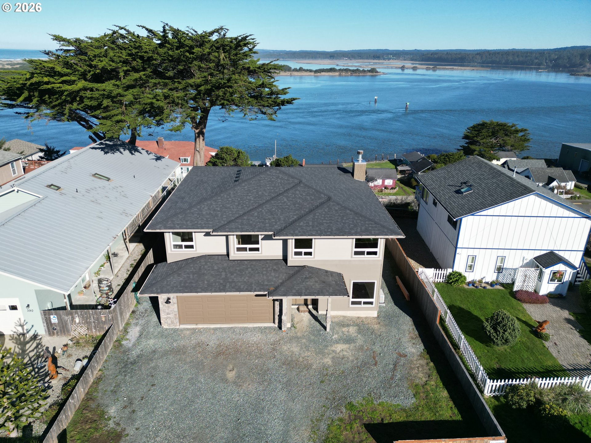 360 2nd Street Southeast Bandon, OR 97411 - Photo 2 of 28 an aerial view of a house