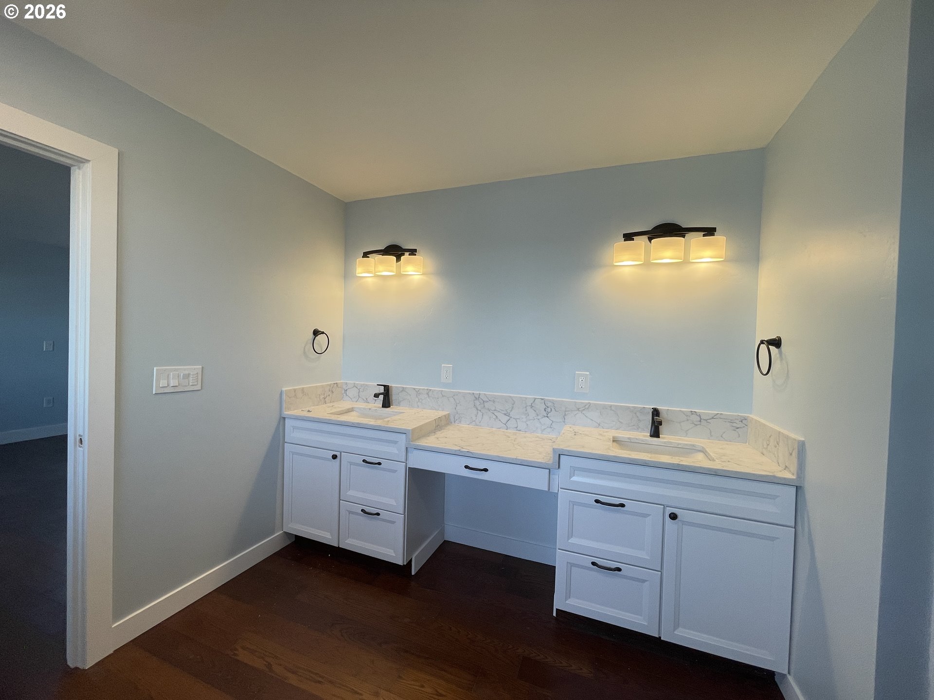 360 2nd Street Southeast Bandon, OR 97411 - Photo 22 of 28 a spacious bathroom with a double vanity sink a mirror and a bathtub