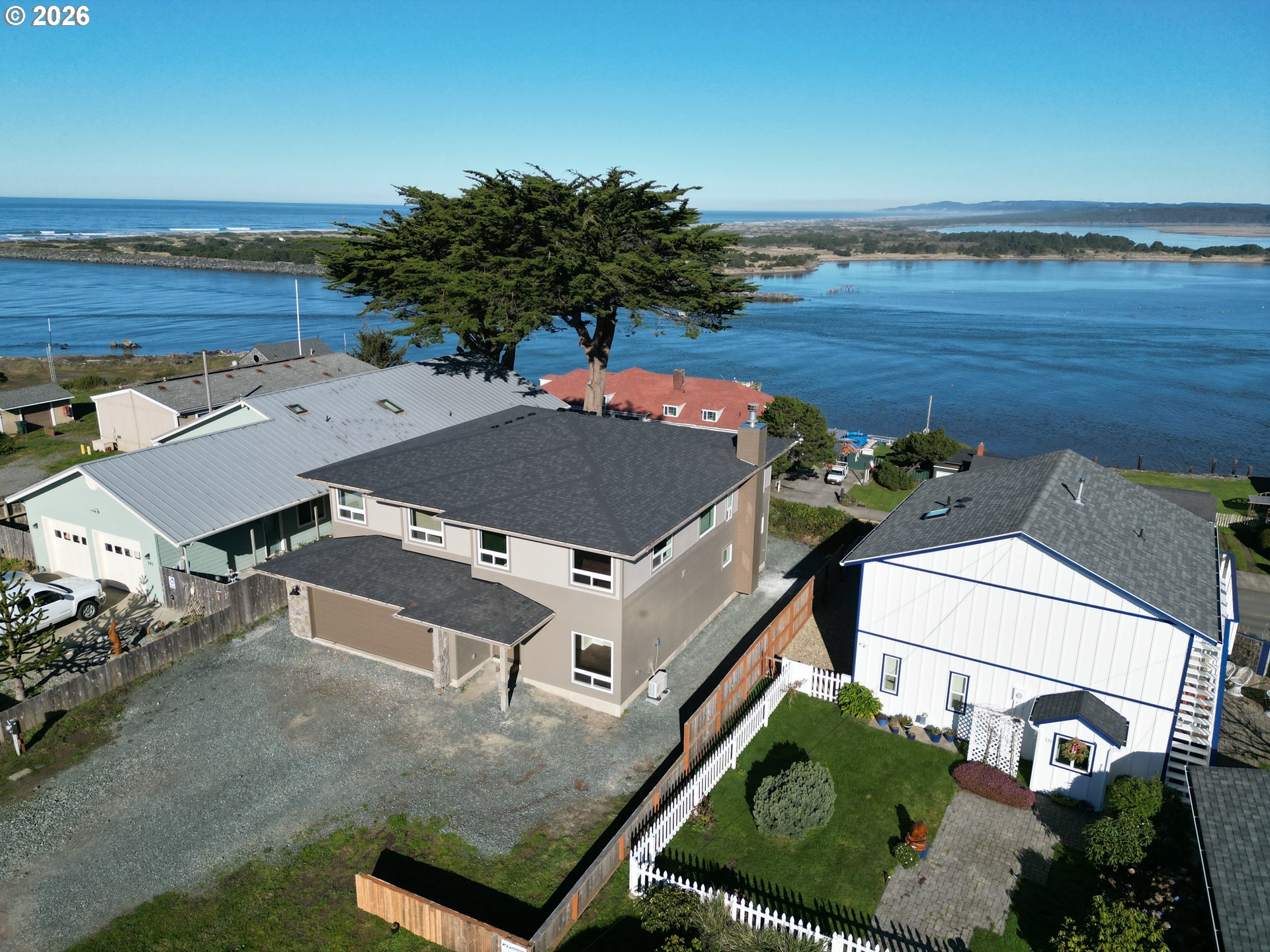 360 2nd Street Southeast Bandon, OR 97411 - Photo 4 of 28 an aerial view of a house