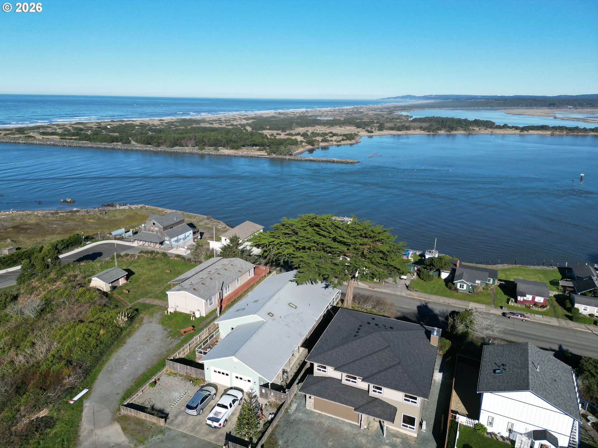 360 2nd Street Southeast Bandon, OR 97411 - Photo 8 of 28 an aerial view of a residential houses with outdoor space