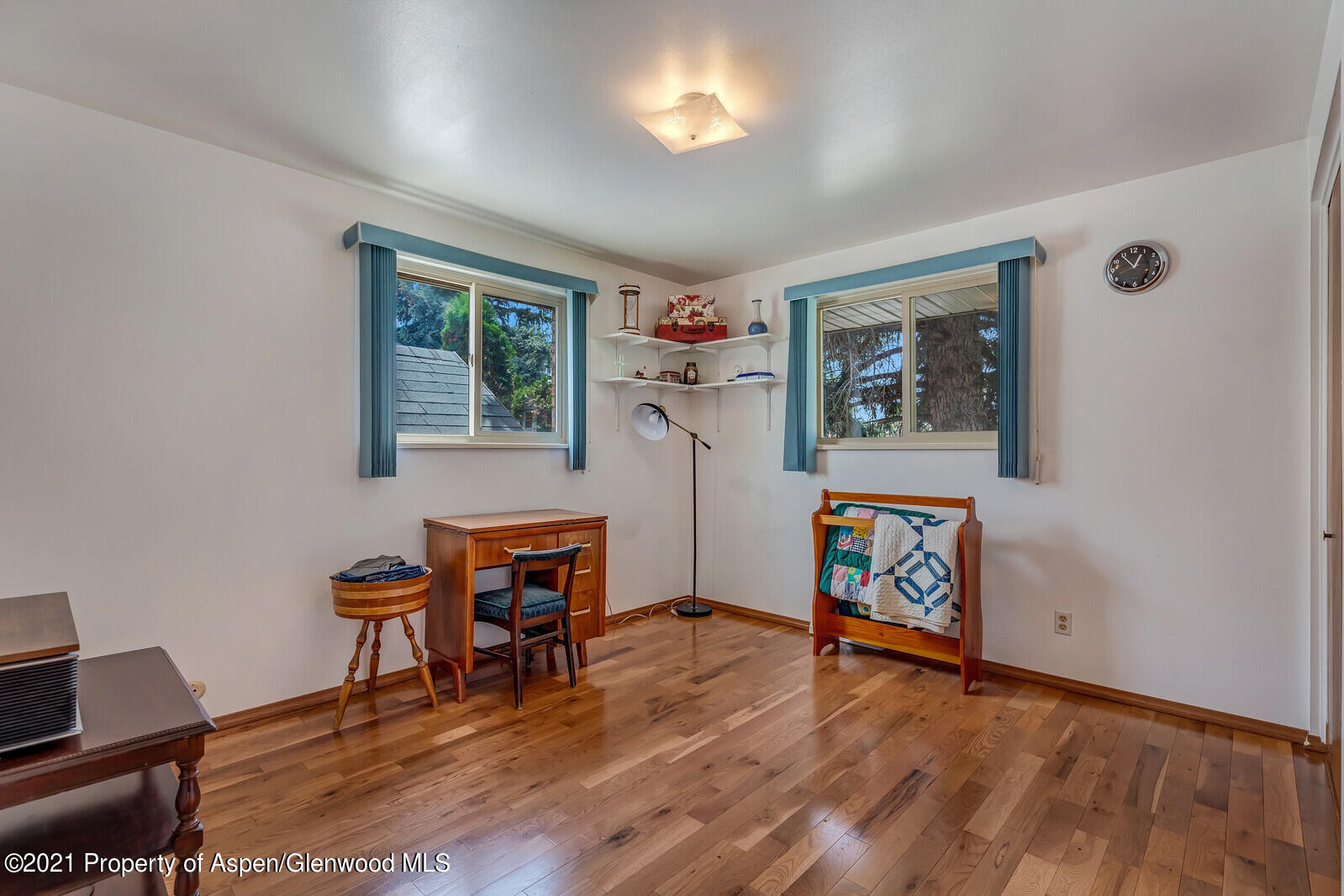446 Elm Avenue Rifle, CO 81650 - Photo 14 of 28 a workspace with furniture window and wooden floor
