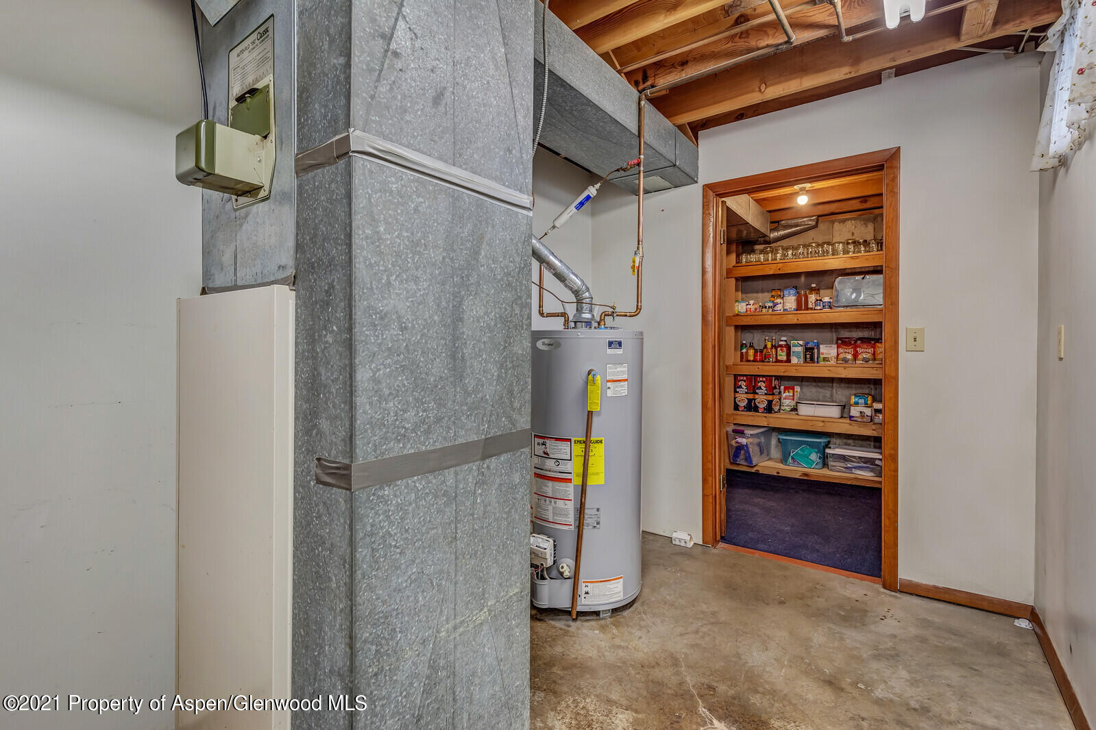 446 Elm Avenue Rifle, CO 81650 - Photo 21 of 28 a view of walk in closet with clothes and shoes