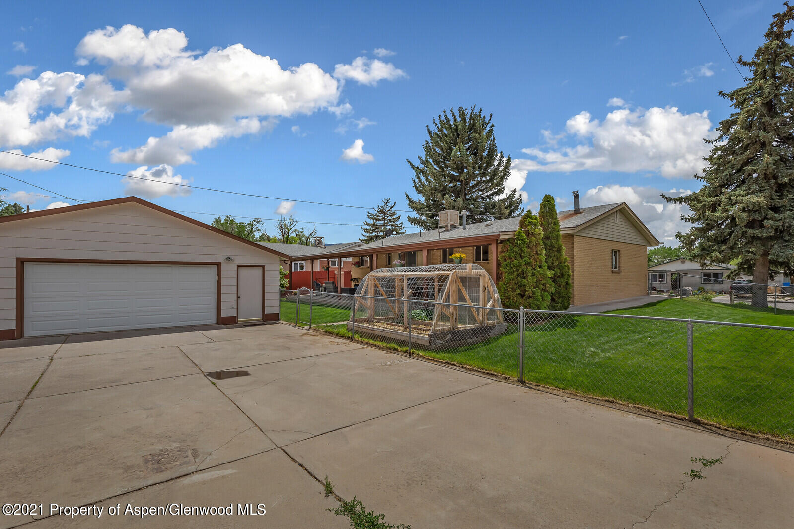 446 Elm Avenue Rifle, CO 81650 - Photo 22 of 28 a view of a house with a yard