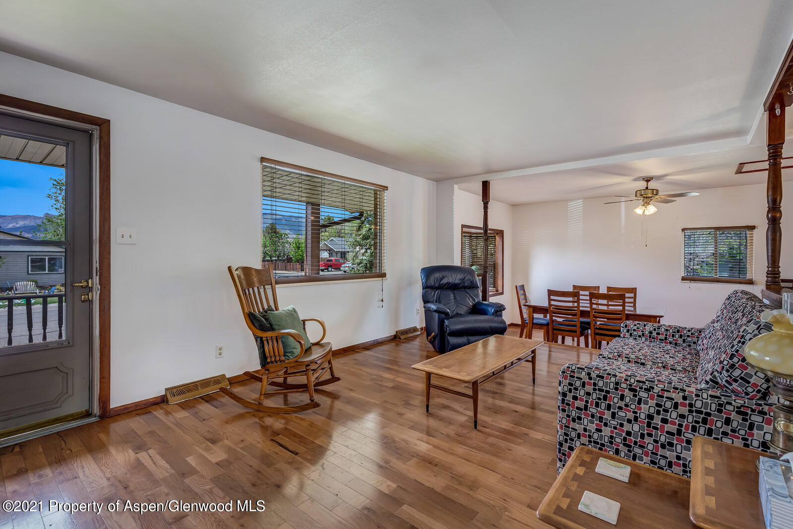 446 Elm Avenue Rifle, CO 81650 - Photo 3 of 28 a living room with furniture and a window