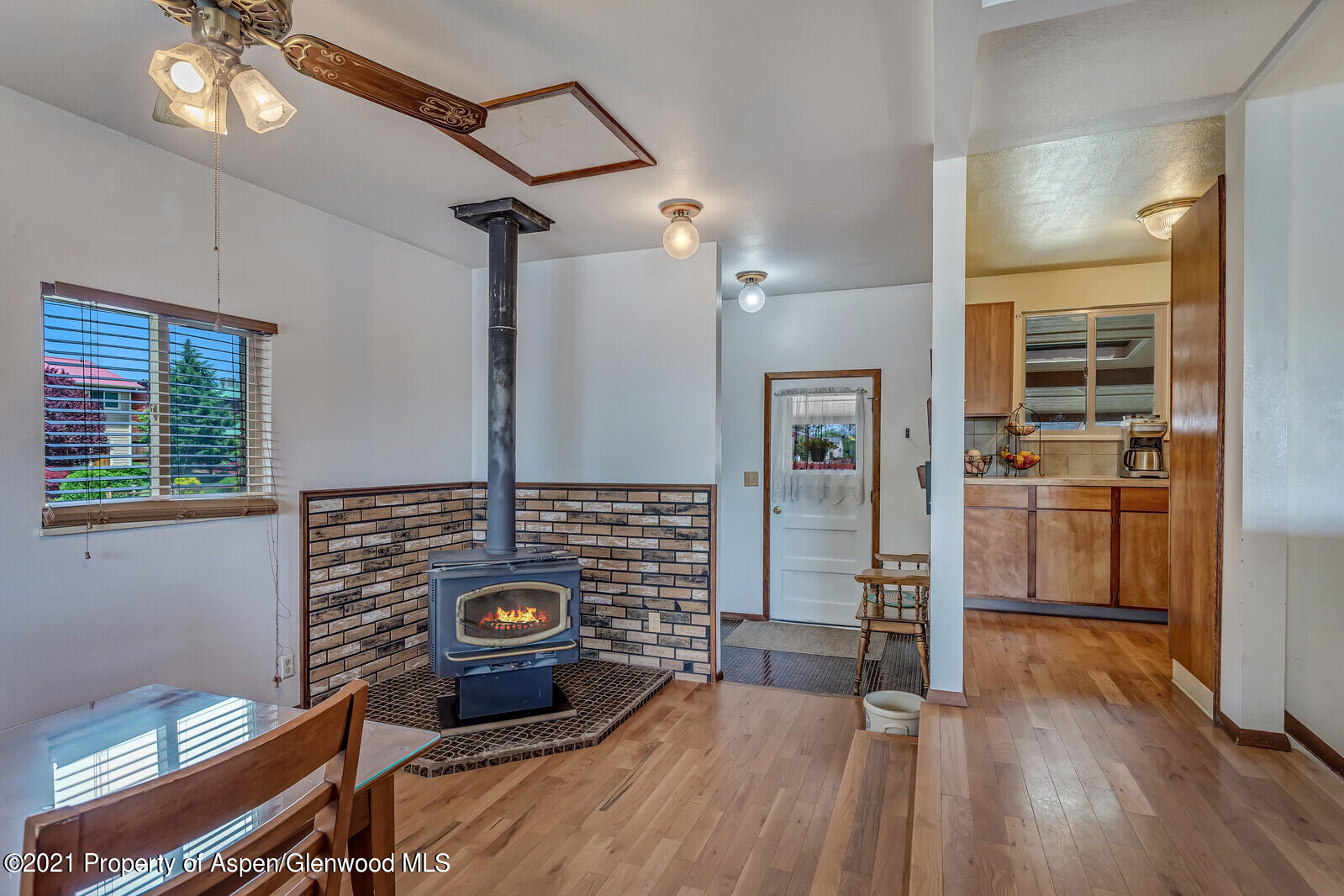 446 Elm Avenue Rifle, CO 81650 - Photo 5 of 28 a view of a livingroom with furniture wooden floor closet and windows