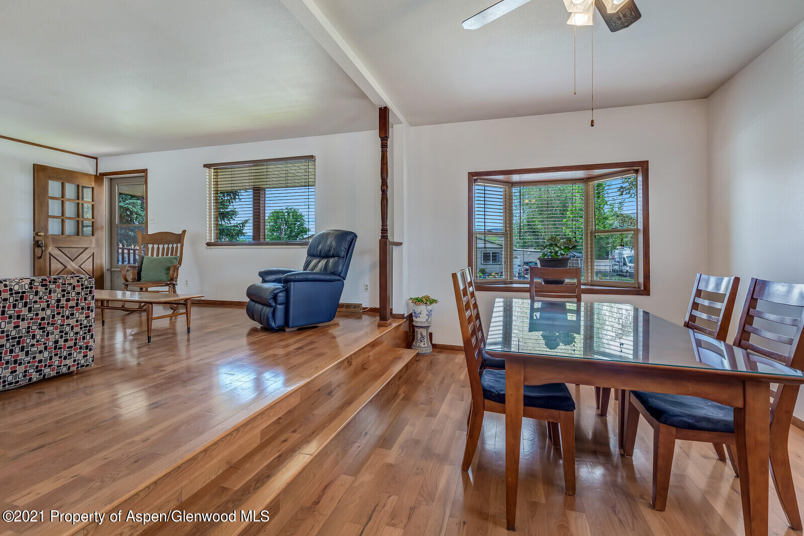 446 Elm Avenue Rifle, CO 81650 - Photo 8 of 28 a living room with furniture and wooden floor