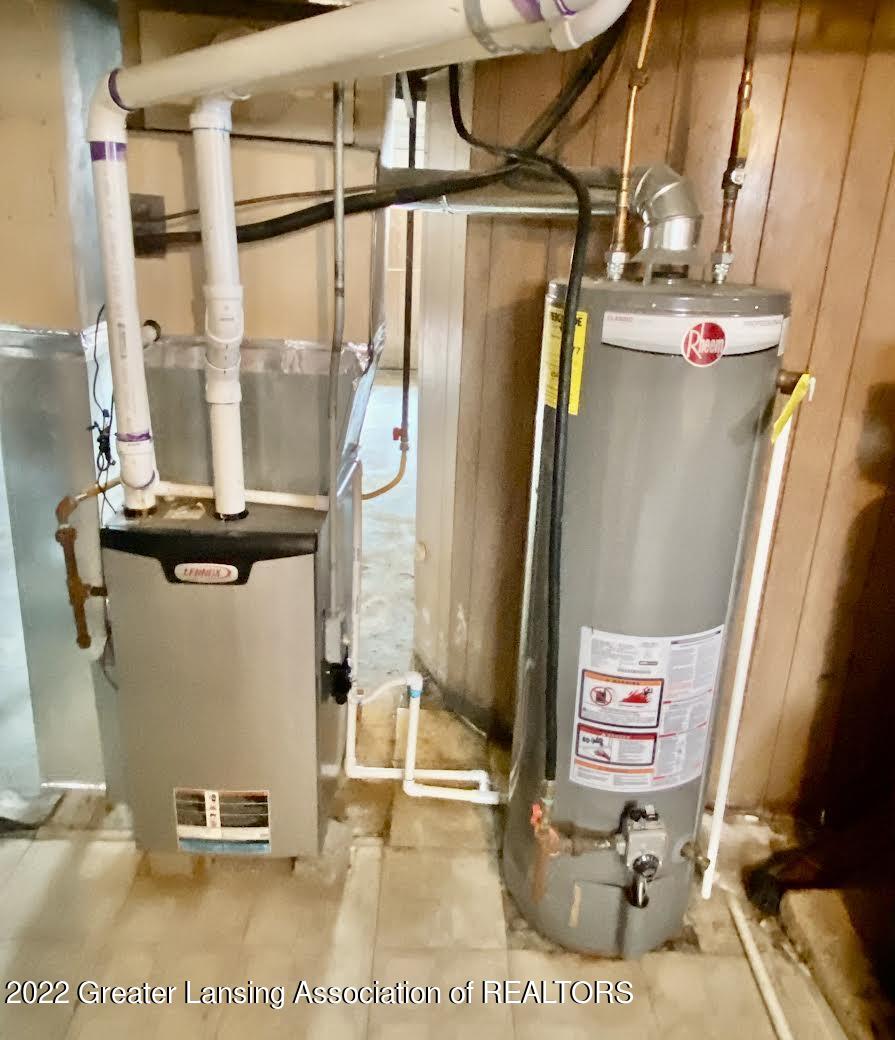 2210 South Cochran Road, Unit R4 Charlotte, MI 48813 - Photo 23 of 25 Basement Furnance H20 heater