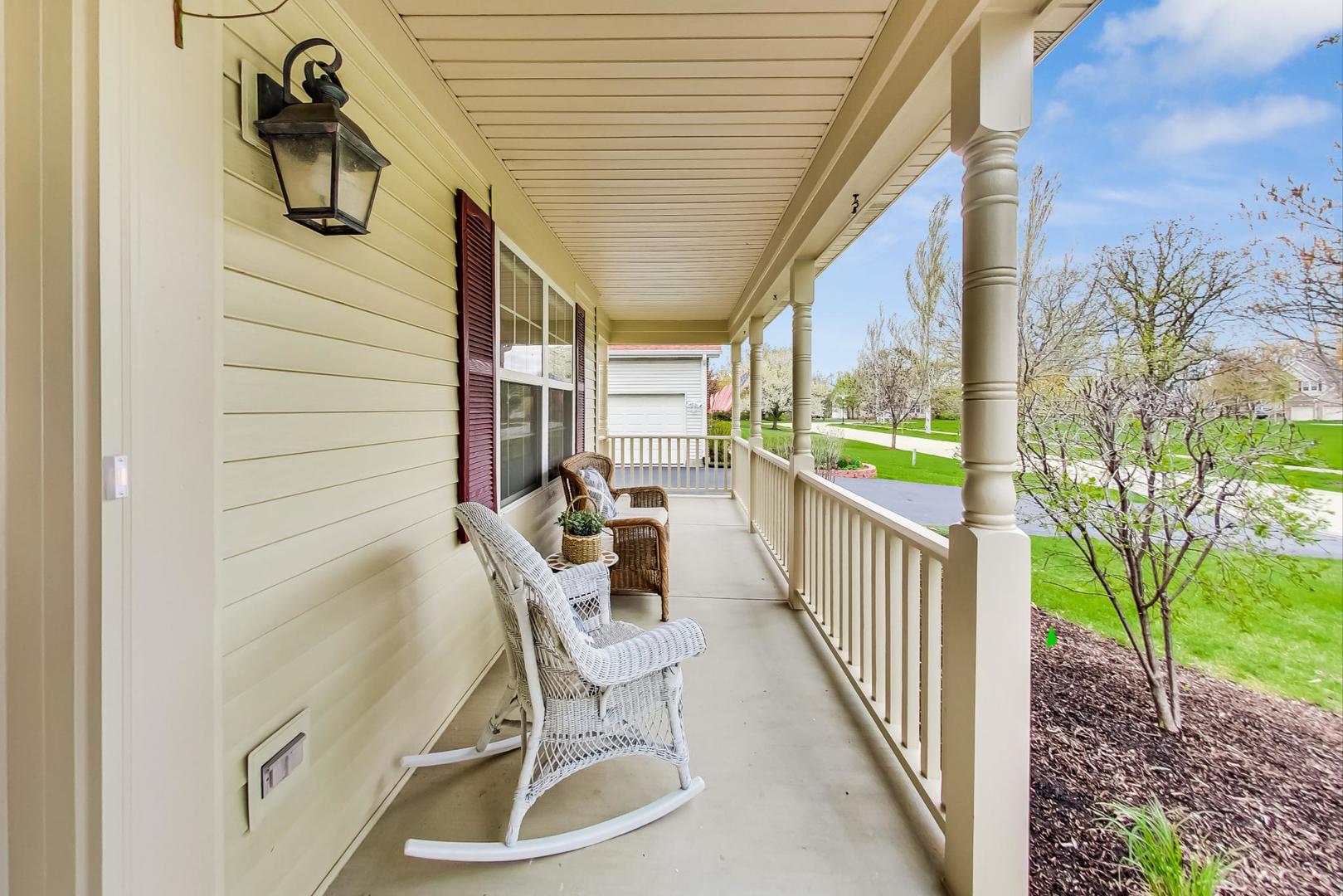 8052 Orchard Commons West Long Grove, IL 60060 - Photo 3 of 32 a view of a porch with seating space