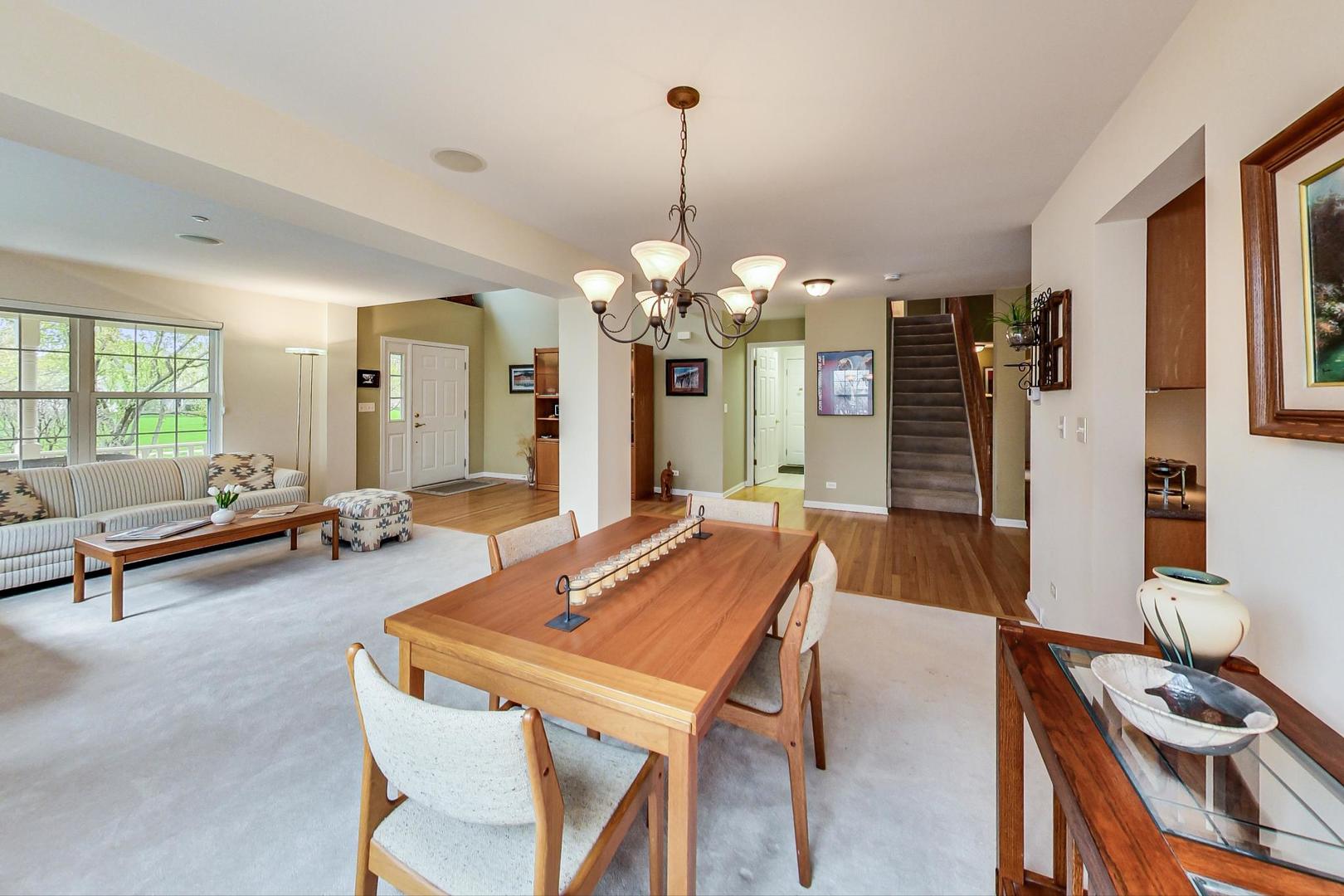 8052 Orchard Commons West Long Grove, IL 60060 - Photo 7 of 32 a room with chandelier and pool table
