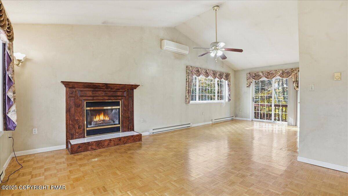 349 Bumble Bee Pass Cresco, PA 18326 - Photo 13 of 109 a view of an empty room with a fireplace and a window