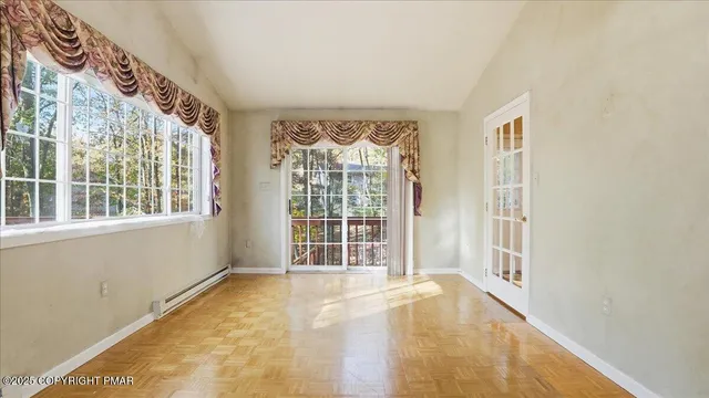 a view of a kitchen with a sink and a microwave