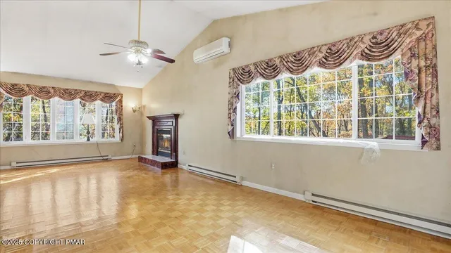 a kitchen with cabinets appliances a sink and a window