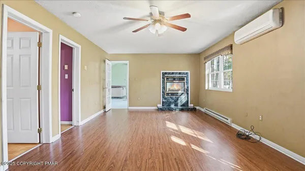a kitchen with stainless steel appliances granite countertop a stove and a refrigerator