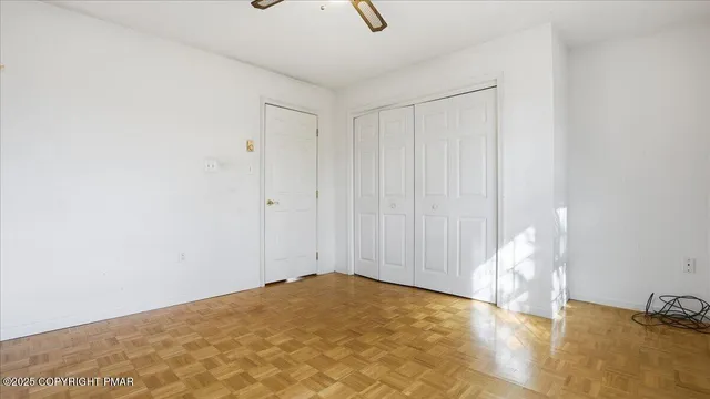 a view of a yard with large trees