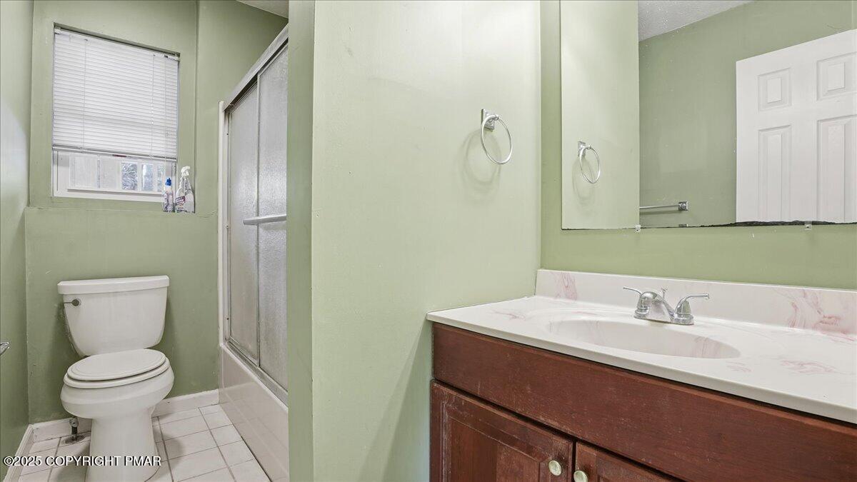 349 Bumble Bee Pass Cresco, PA 18326 - Photo 49 of 109 a bathroom with a sink toilet and a mirror