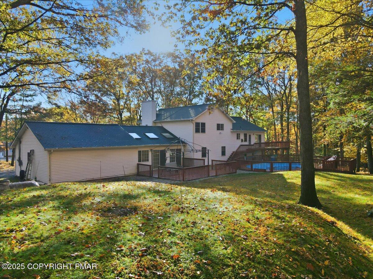 349 Bumble Bee Pass Cresco, PA 18326 - Photo 76 of 109 a view of a house with a yard