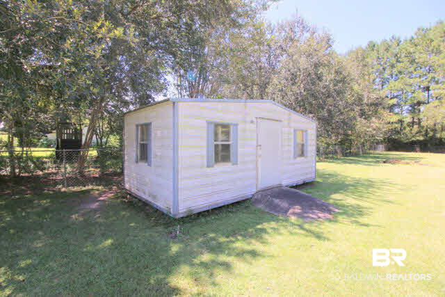 16809 River Park Road Fairhope, AL 36532 - Photo 14 of 18 Plenty of room for tool and riding mower. The lot is level so mowing is a breeze!