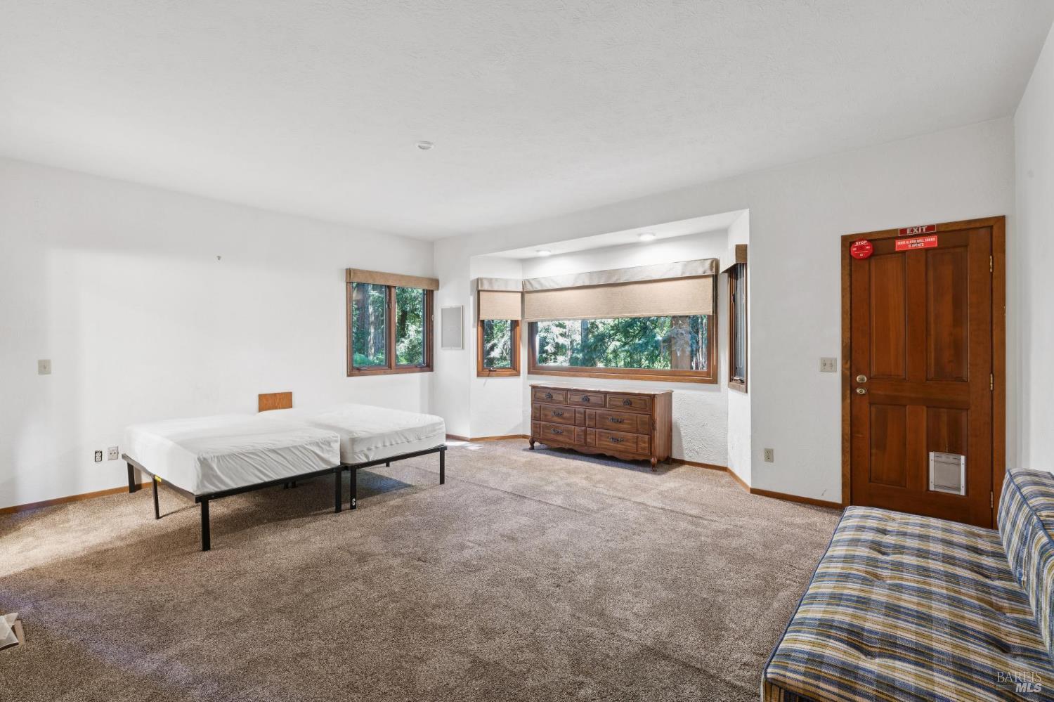 11910 Graton Road Sebastopol, CA 95472 - Photo 39 of 81 a living room with furniture and a window