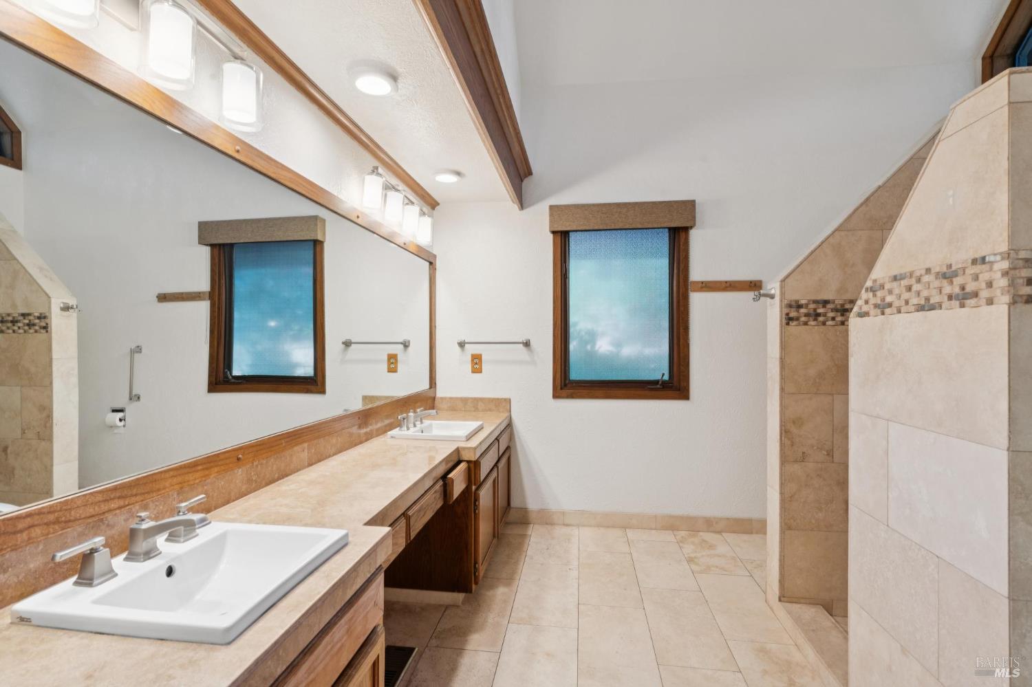 11910 Graton Road Sebastopol, CA 95472 - Photo 40 of 81 a bathroom with a sink and a mirror