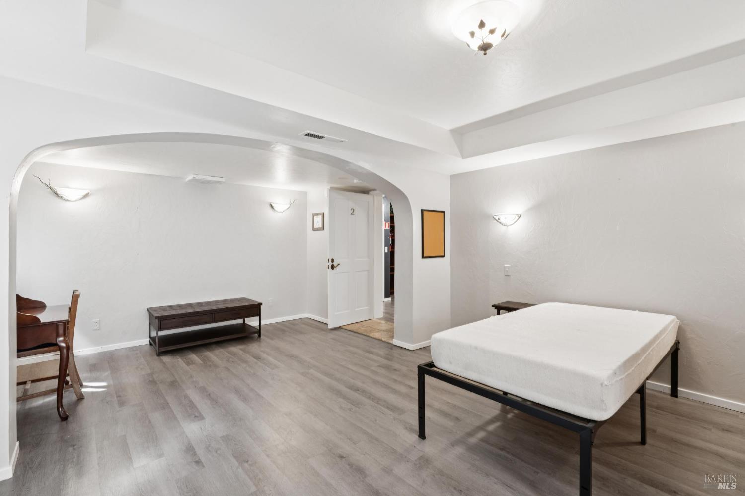 11910 Graton Road Sebastopol, CA 95472 - Photo 52 of 81 a view of a room with furniture and wooden floor