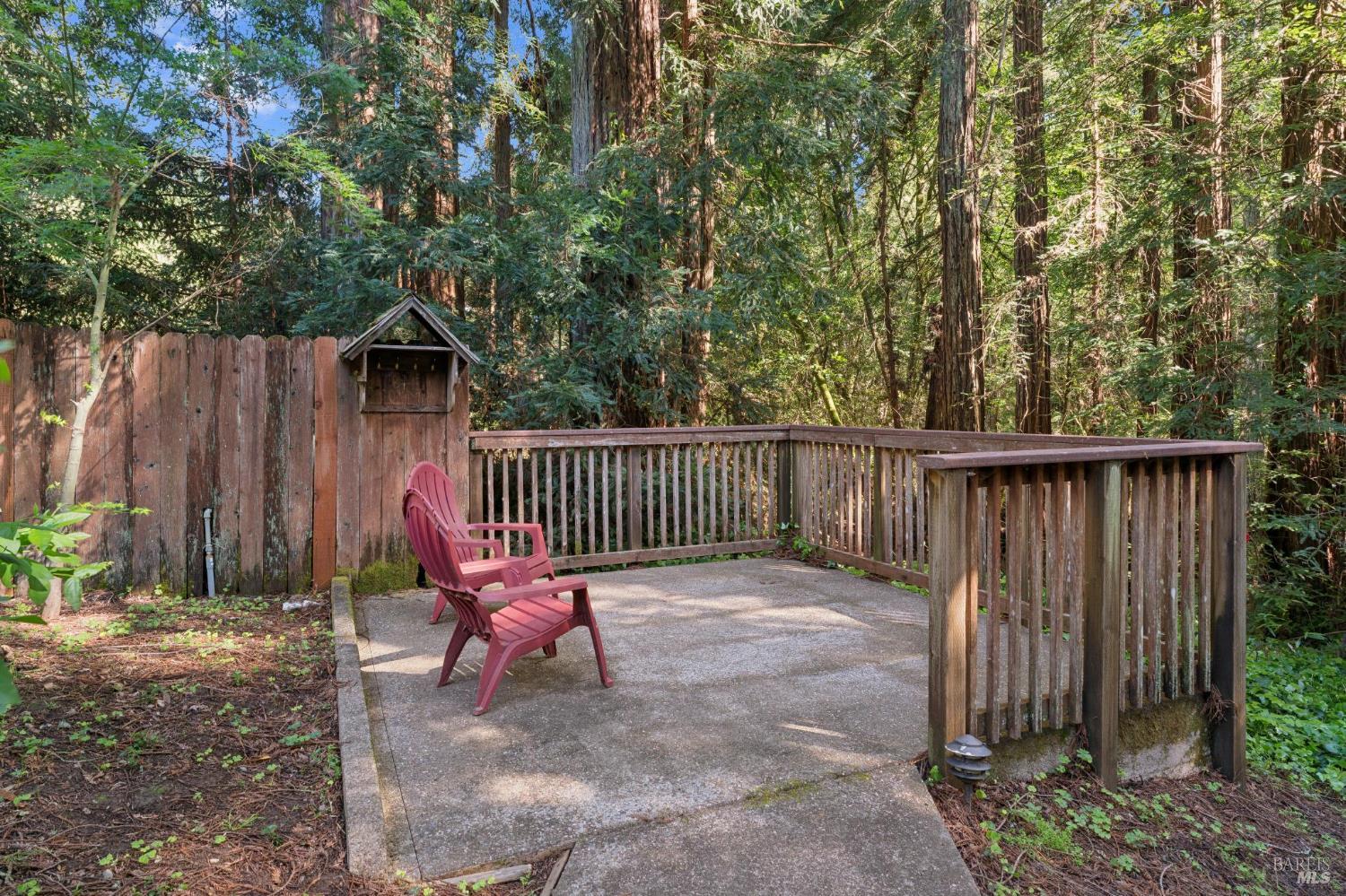 11910 Graton Road Sebastopol, CA 95472 - Photo 65 of 81 a view of a wooden fence with a bench in a backyard