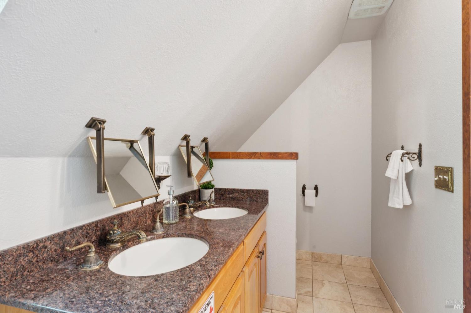 11910 Graton Road Sebastopol, CA 95472 - Photo 81 of 81 a bathroom with a sink and a mirror