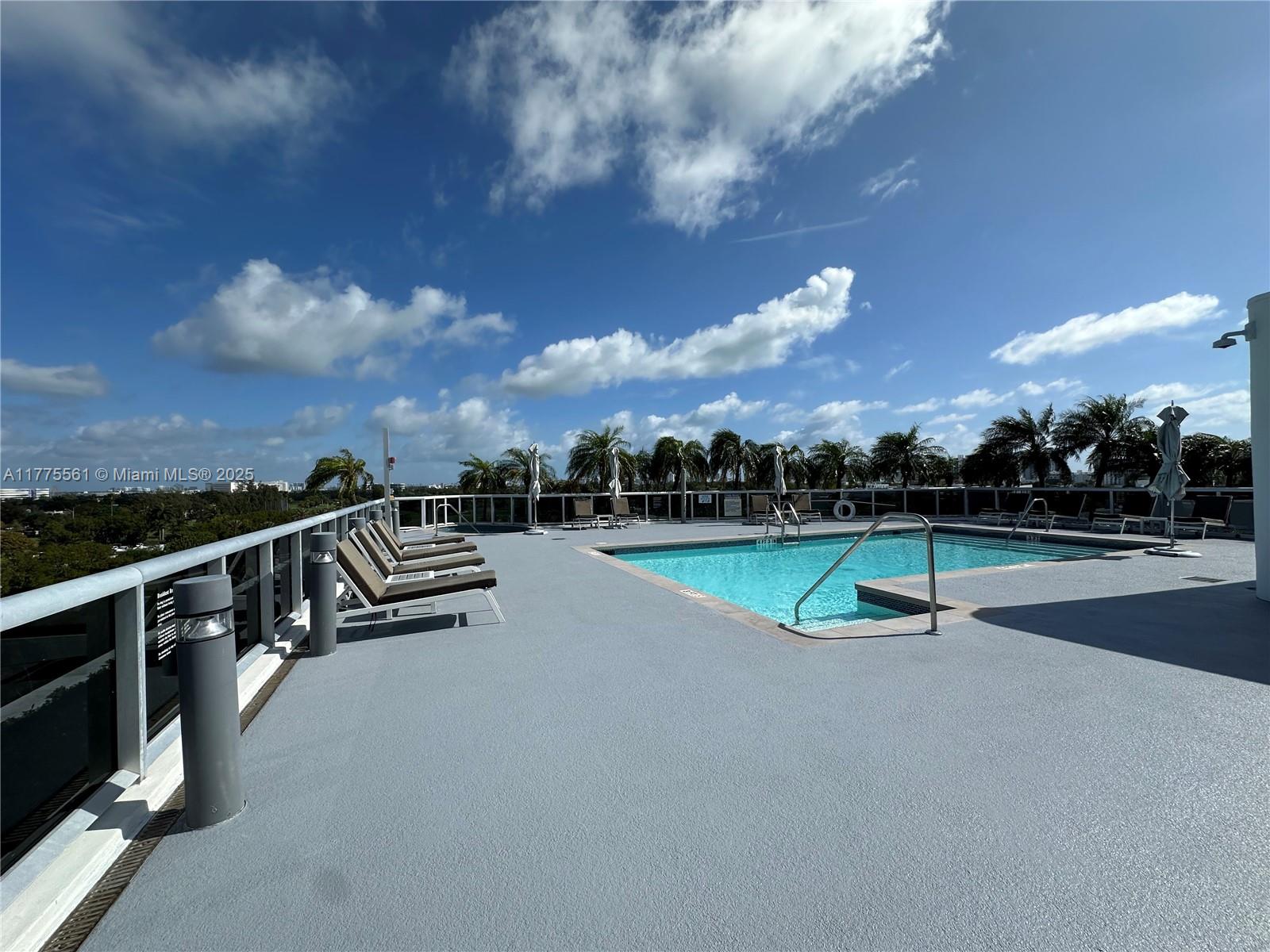 2001 Meridian Avenue, Unit 309 Miami Beach, FL 33139 - Photo 21 of 21 a view of swimming pool with yard and outdoor seating