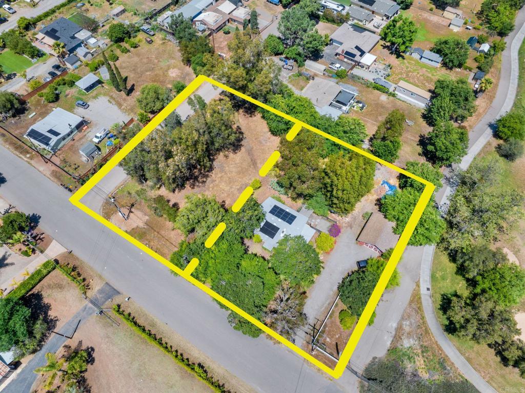 2766 Quail Road Escondido, CA 92026 - Photo 1 of 1 an aerial view of a tennis ground and a large swimming pool