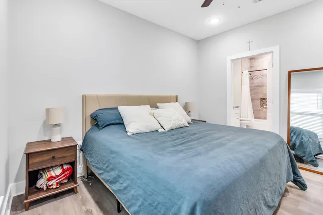 a bedroom with a bed and a closet