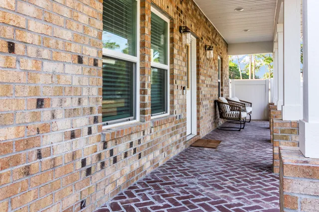 a view of a porch with a bench