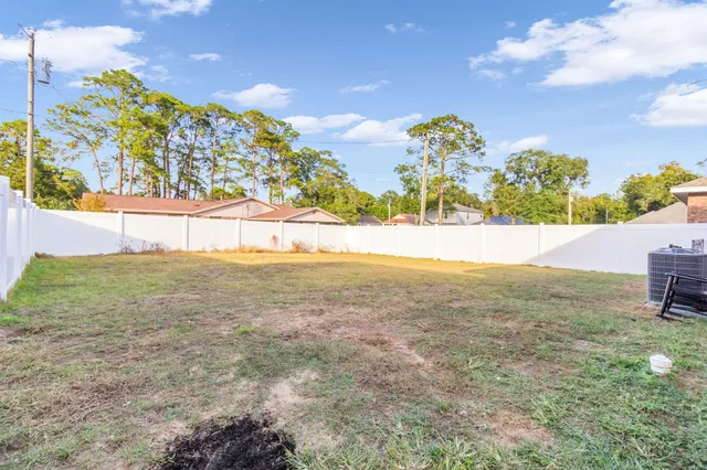 a view of an outdoor space and a yard