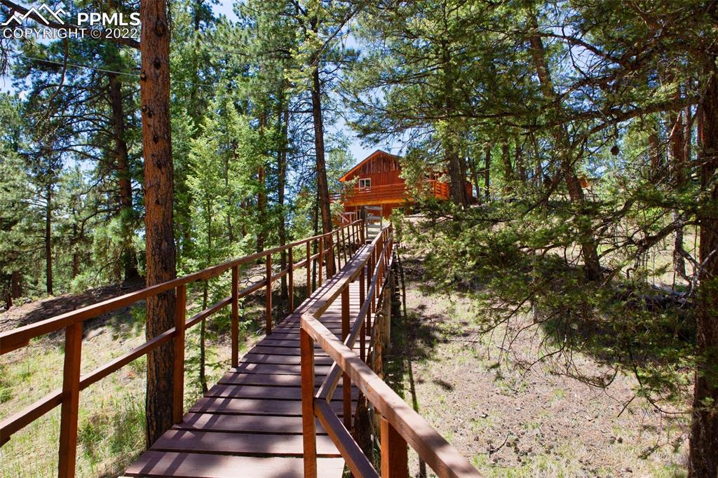 7199 Cedar Mountain Road Divide, CO 80814 - Photo 31 of 34 a view of a staircase