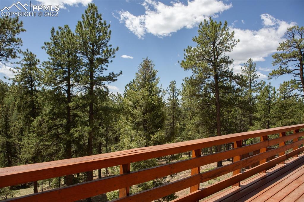 7199 Cedar Mountain Road Divide, CO 80814 - Photo 5 of 34 a city view from a balcony with outdoor space
