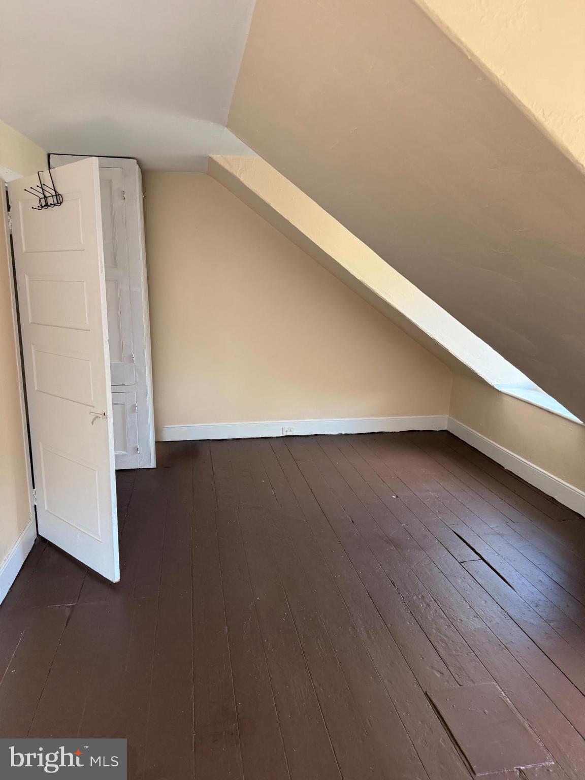 105 West Broadway, Unit C Salem, NJ 08079 - Photo 21 of 26 a view of room with wooden floor